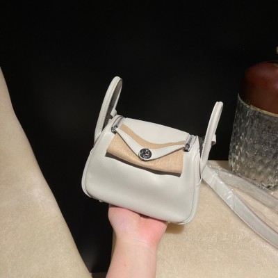 hermes Lindy mini 琳迪 <strong>Swift</strong>皮 M4 奶灰色拼0L积雨云灰(爱马仕琳迪包官网售价)