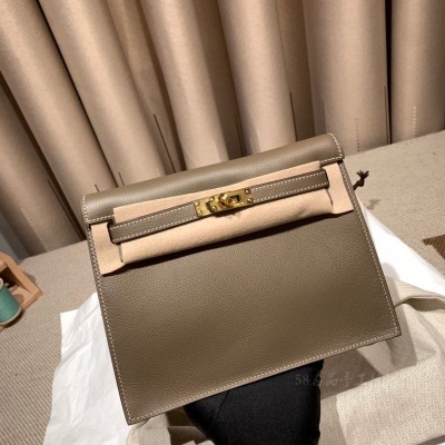hermes kelly Danse 跳舞包 <strong>Evercolor</strong>皮 18大象灰 金扣(爱马仕大象灰凯莉包25寸 专柜售价多少)