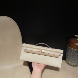 hermes kelly cut 31cm 凯莉手包晚妆包 swift皮 10奶昔白 玫瑰金扣(hermes凯莉包mini) 图片